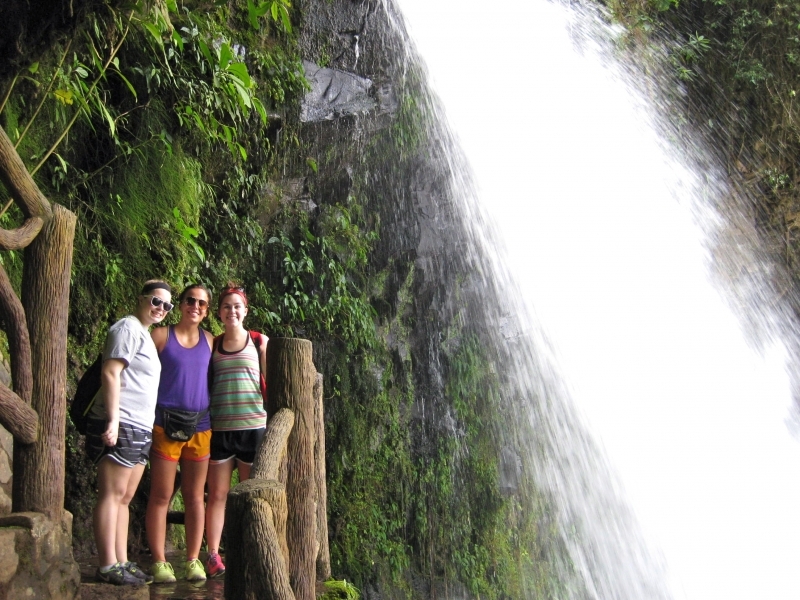 Students at one of the waterfalls at La Paz Waterfall Gardens